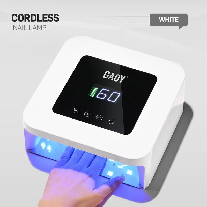 Full hand inside the illuminated white GAOY nail lamp